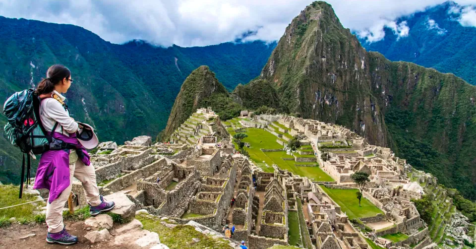 Machu Picchu Expedition with Peru Grand Travel Landscape of the Machu Picchu archaeological sanctuary and surrounding lush green peaks with Peru Grand Travel